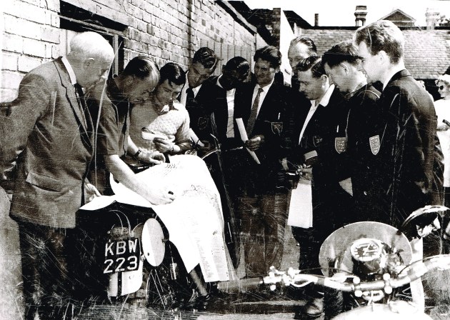 Photo - British team checking over the paper work ISDT 1959 (Colin Moram collection)
