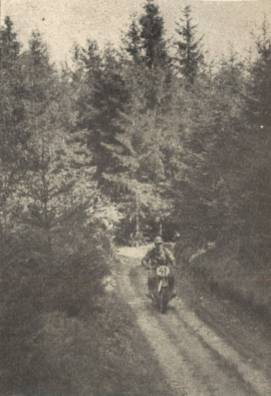 Photo - That was the typical terrain at the first day, narrow forrest tracks, interrupted by short boulder sections and large bathtubs with mud. Rider is #41 NSKK-Obersturmführer [comparable to 1. Lieutenant] Meinl of the Motorgruppe Ostmark on BMW R 51.ISDT 1939 [Ostmark was the name for former Austria, after Germany annexed this country] (das Motorrad)